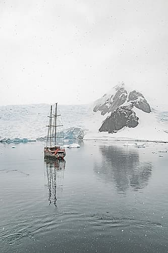Sailboat in Falling Snow Art Print