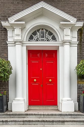Red Door with Pediment and Columns Art Print