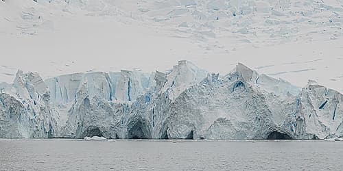 Jagged Glacier Wall with Caves Art Print