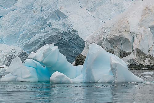 Small Icebergs Before Glacier Wall Art Print