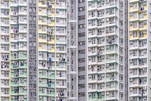 Hong Kong Dense Apartment Facade with Laundry Art Print by Richard Silver