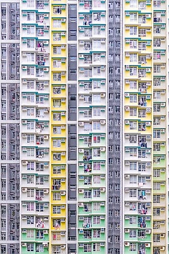 Hong Kong Dense Apartment Facade Vertical Art Print by Richard Silver