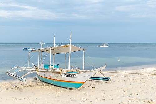 Bangka Outrigger Fishing Boat on Tropical Beach, Philippines Art Print