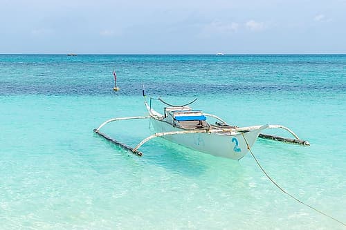 Outrigger Boat in Crystal Clear Water, Philippines, Southeast Asia Art Print