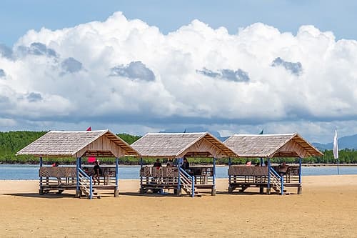 Thatched Beach Cabanas on Sandy Shore, Philippines Art Print