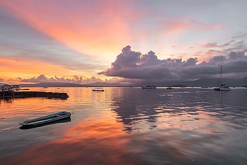 Colorful Sunset Reflections Over Harbor, Philippines Art Print by Richard Silver