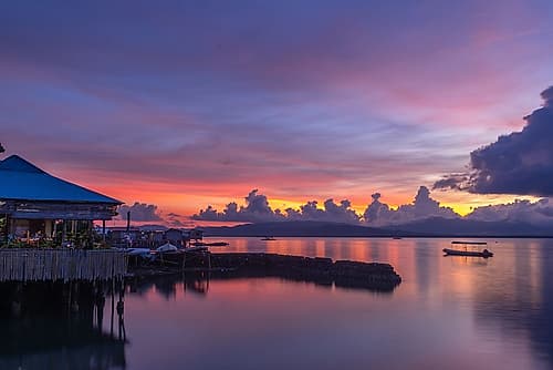 Sunset Over Water with Waterfront Pavilion, Philippines Art Print