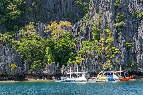 Boats Anchored Near Limestone Cliffs, El Nido, Palawan, Philippines Art Print