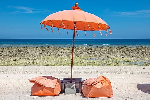 Orange Beach Umbrella and Bean Bags, Gili Islands, Indonesia Art Print