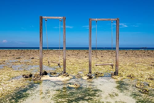 Wooden Swings on Exposed Coral Reef, Gili Islands, Indonesia Art Print