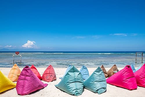 Row of Colorful Beach Bean Bags, Gili Islands, Indonesia Art Print