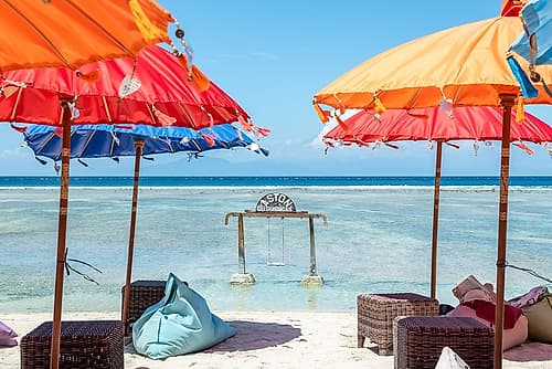 Red and Orange Beach Umbrellas with Swing, Gili Islands, Indonesia Art Print