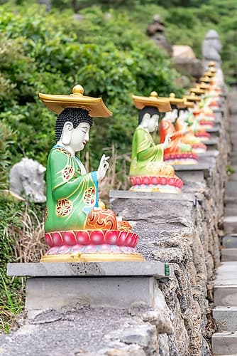Row of Colorful Buddha Statues on Temple Steps, Jeju Island, South Korea Art déco reproduction