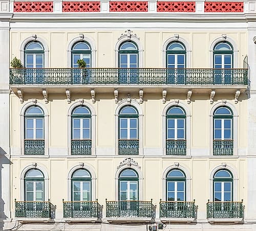 Cream Facade with Arched Windows and Balconies, Lisbon, Portugal Art Print