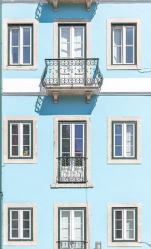 Pale Blue Facade with Wrought Iron Balcony, Lisbon, Portugal Art Print