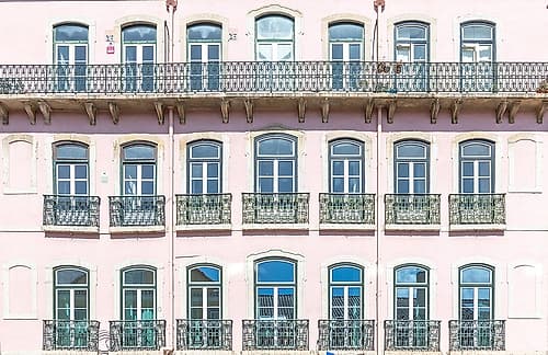 Pink Facade with Arched Windows and Balconies, Lisbon, Portugal Art Print
