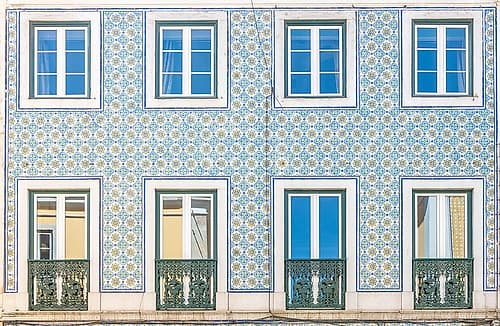 Blue and Yellow Tiled Facade with Balconies, Lisbon, Portugal Art Print