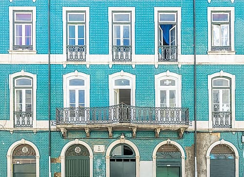 Teal Tiled Facade with Arched Doorways, Lisbon, Portugal Art Print by Richard Silver