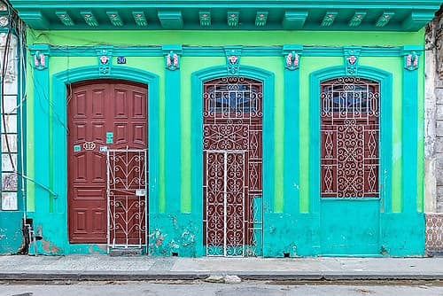 Green and Yellow Weathered Facade, Havana, Cuba Art Print