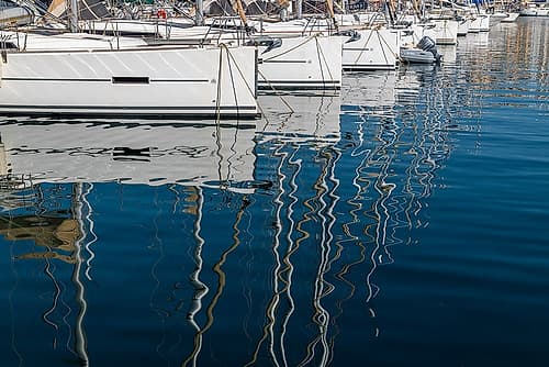 Sailboat Mast Reflections in Marina Art Print