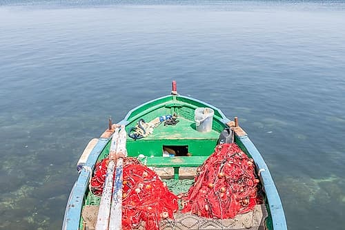 Green Fishing Boat with Red Nets Art Print