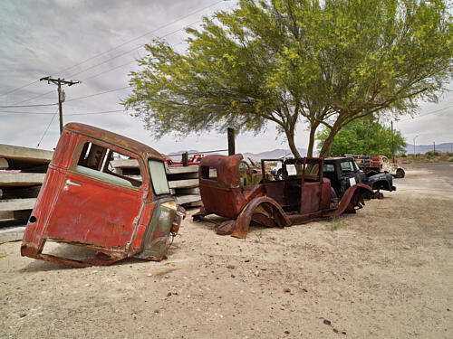 Rusted Relics in an Automobile Graveyard Near Yucca, Arizona I Art Print