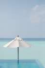 White Beach Umbrella Art Print