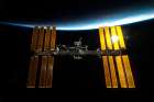 The International Space Station backdropped by Earth├óΓé¼Γäós Horizon Art Print