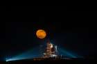 The Moon Rising behind the Space Shuttle Endeavour on pad 39A Art Print