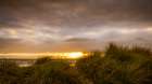 Sunset Through the Dunes Art Print