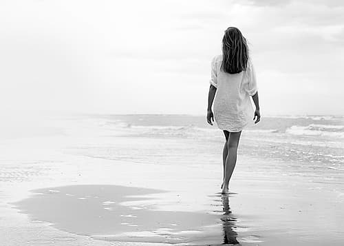 Walking on a White Beach Art Print